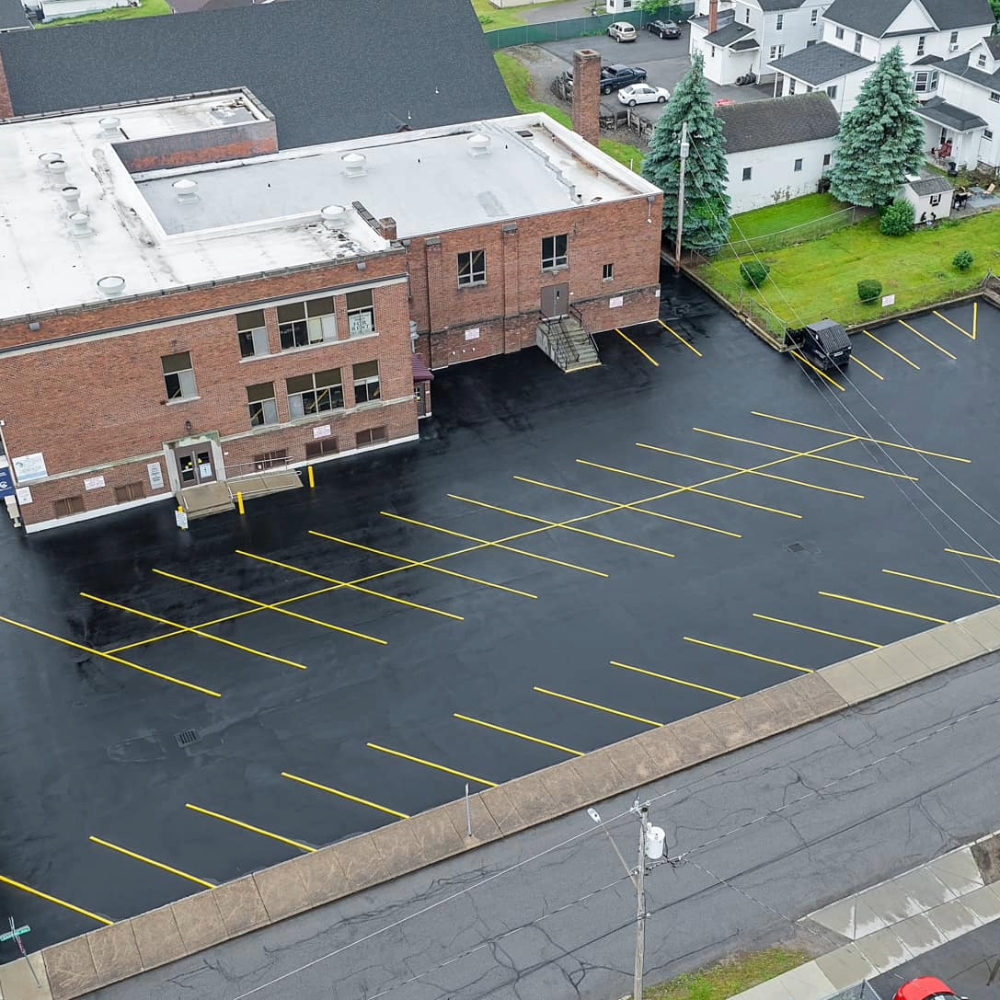 sealcoating services, asphalt sealcoating, parking lot sealcoating, driveway sealcoating, asphalt crack sealing, line striping services, parking lot striping, pavement markings, asphalt maintenance, commercial sealcoating, residential sealcoating, asphalt protection coating, restriping parking lots, pavement striping contractors, sealcoat and stripe service